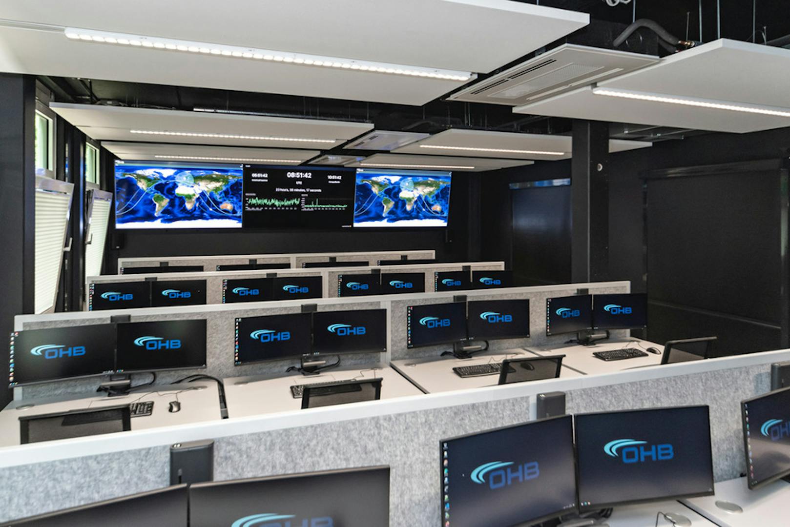 references- OHB Digital Connect GmbH- Mainz-lino desk electrically height-adjustable-desk connection panels in special design_ powder-coated table tops in special shape- Acoustic panels & privacy screen made of polyester fleece- sano swivel chair