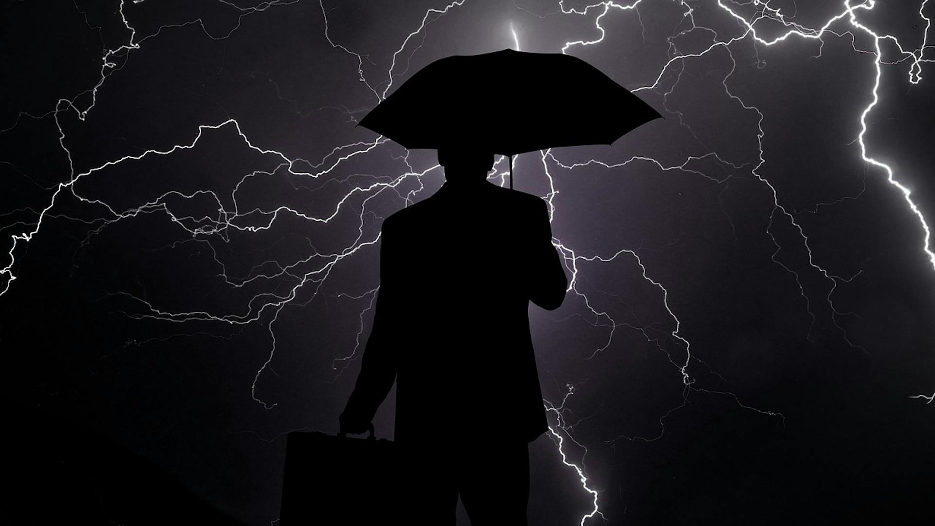 Businessman im Gewitter-Leitbild
