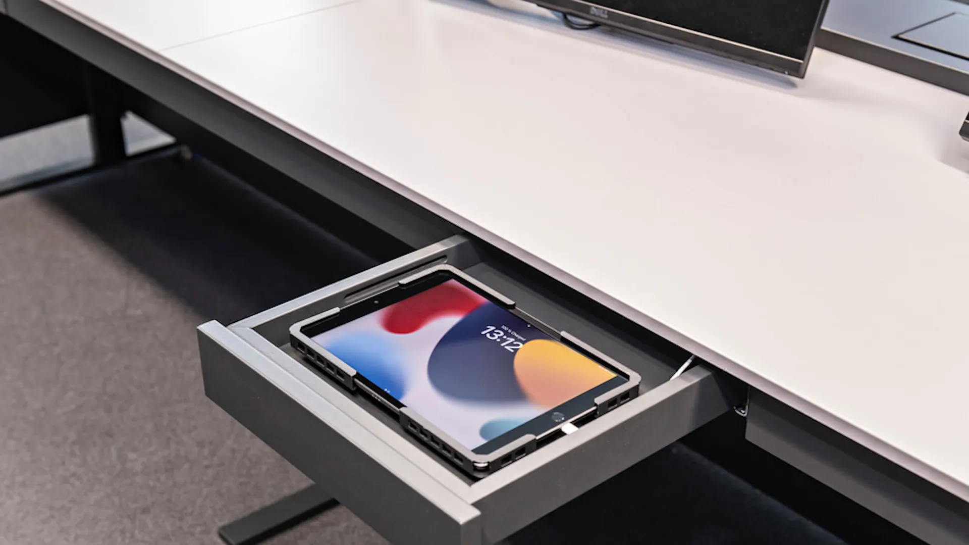 References_ OHB System AG_ Bremen_ Special conference table solution_ Customised table connection panels_ Powder-coated table tops and revisable legroom panels_ Substructures for media technology integration_ Drawers for tablet storage_ Integration of screen mounts