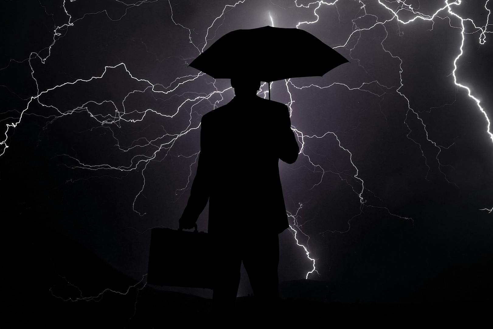 Businessman im Gewitter-Leitbild