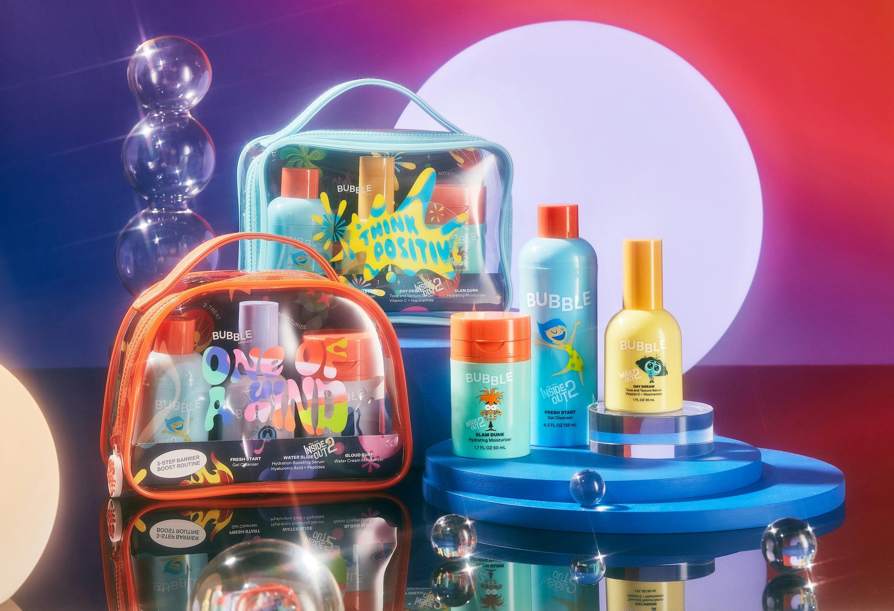 Bubble skincare products in various clear travel sized cosmetic cases