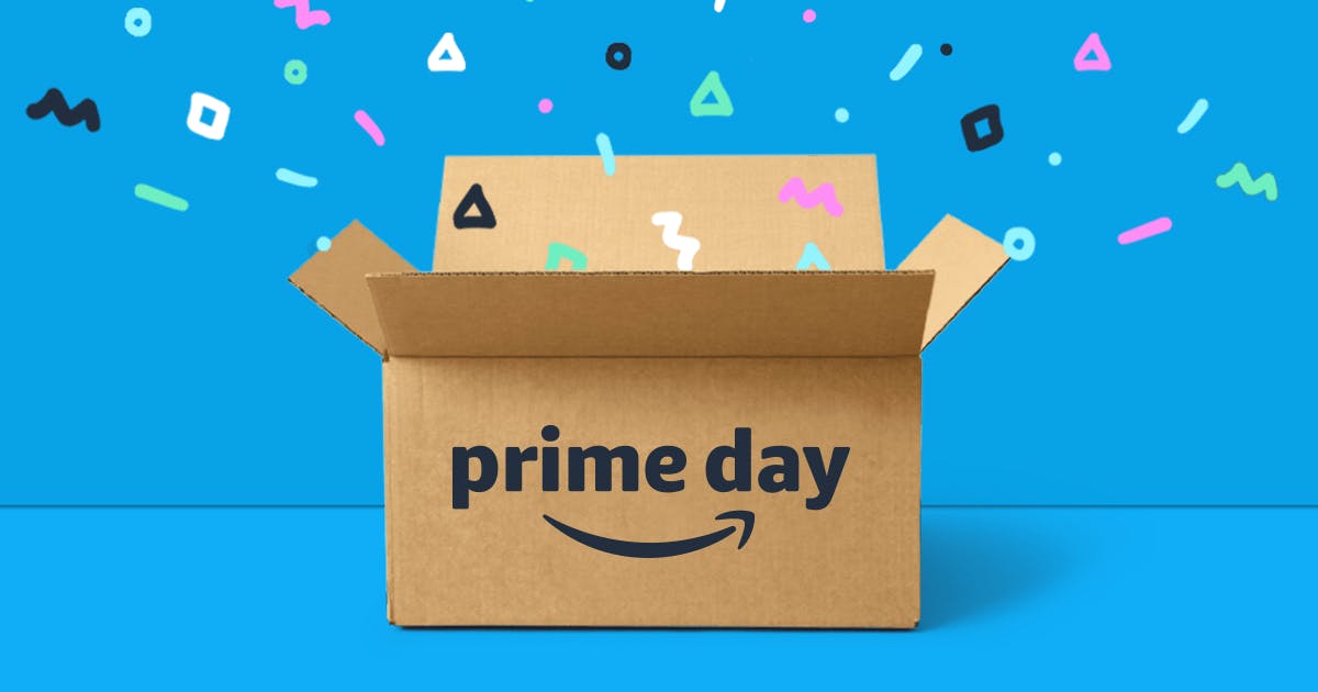 A cardboard box with the Amazon Prime Day logo on it and confetti coming out of it. Text on the box reads “Prime Day”.
