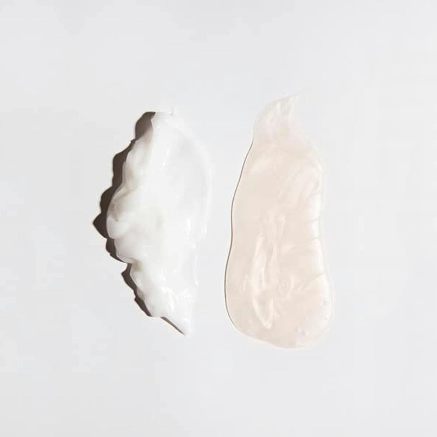 Swatches of shampoo and conditioner on a white background