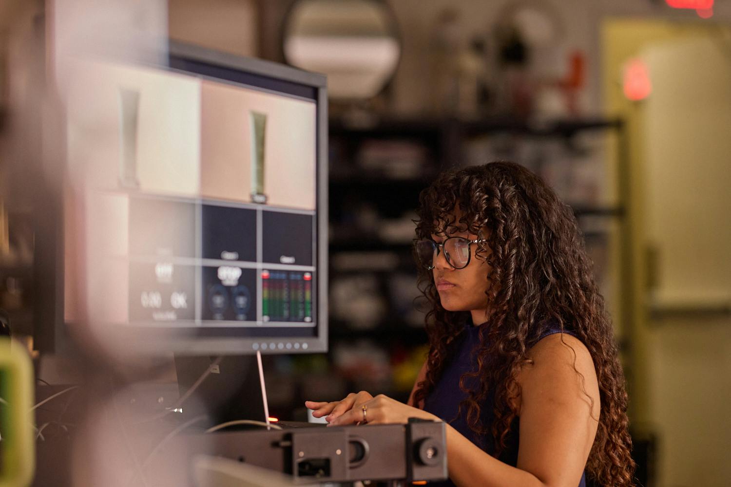girl working on a video shoot wearing glasses