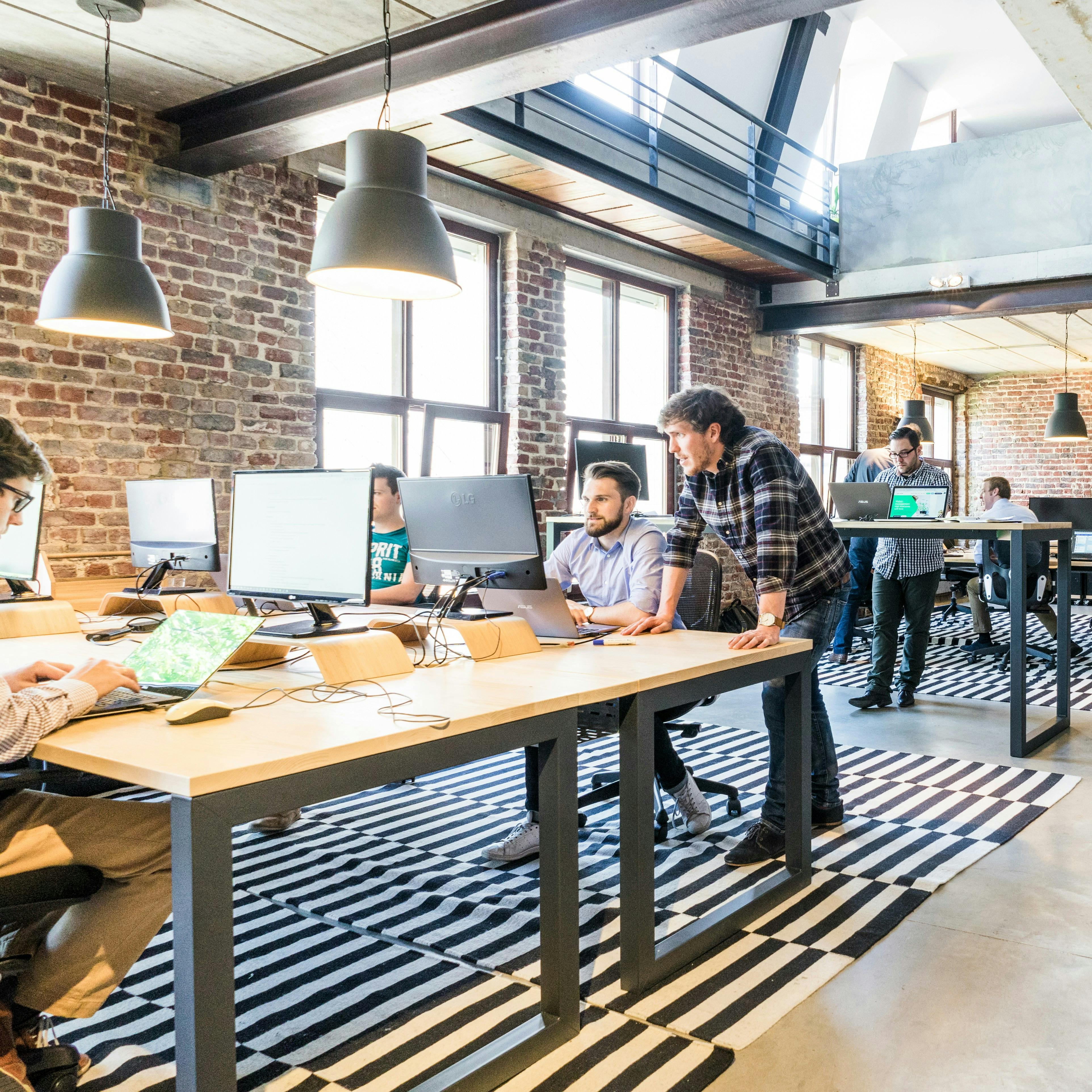 Office full of people working with computers