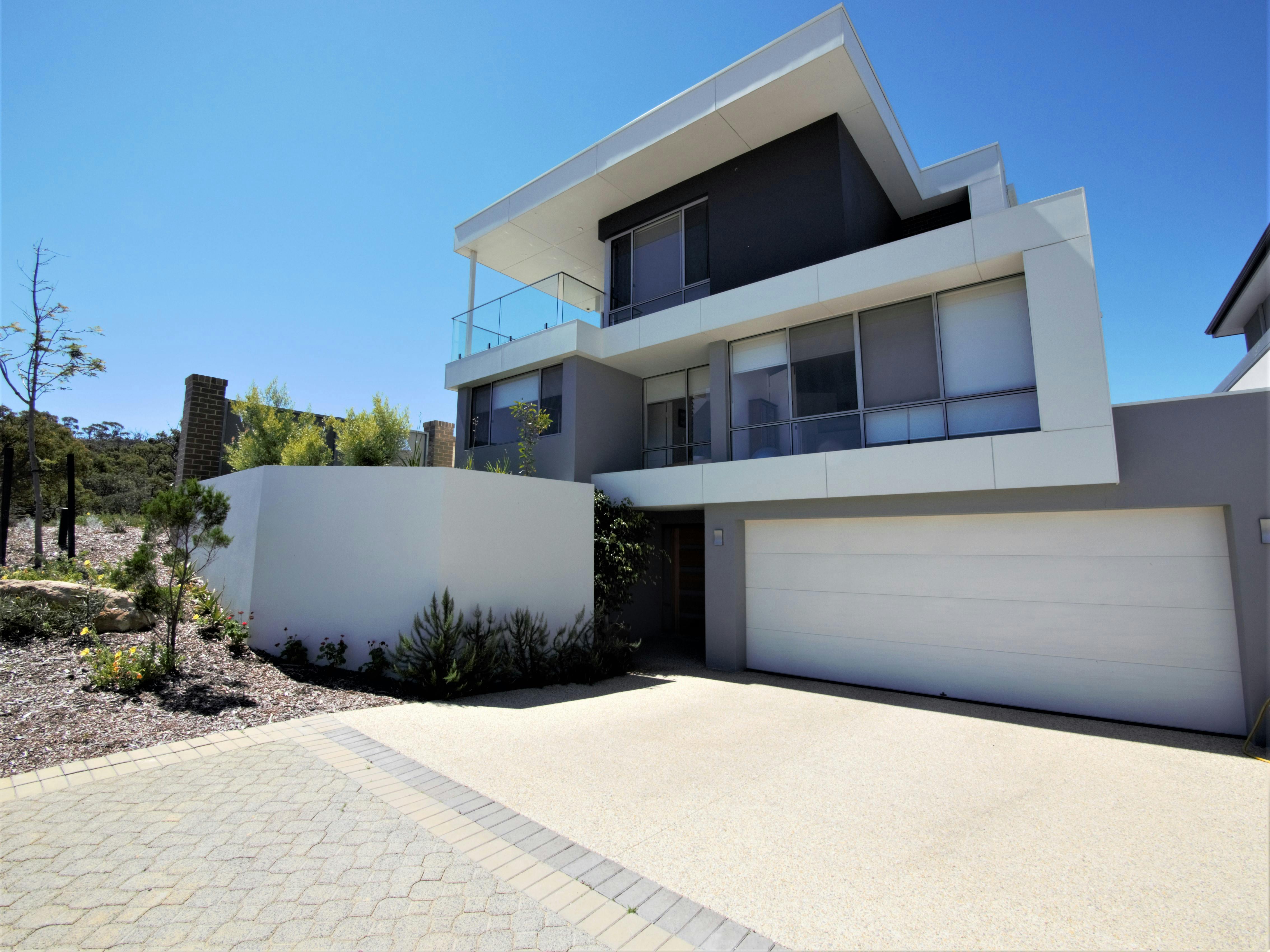 This house was constructed on a 350m2 block, and it was imperative to the clients that we could maximize the outdoor living space, so we designed the house with an undercroft garage area to allow more room the first floor which gave us more space to the alfresco and pool area. We also installed a luxury elevator for convenience with shopping and other items when arriving form the ground floor garage. 