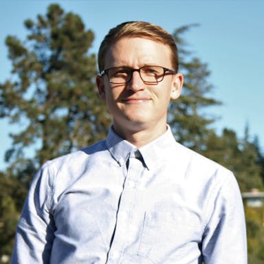 man with blue shirt 
