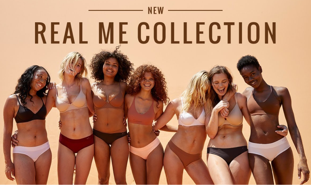 A group of confident women in their underwear against a beige background.