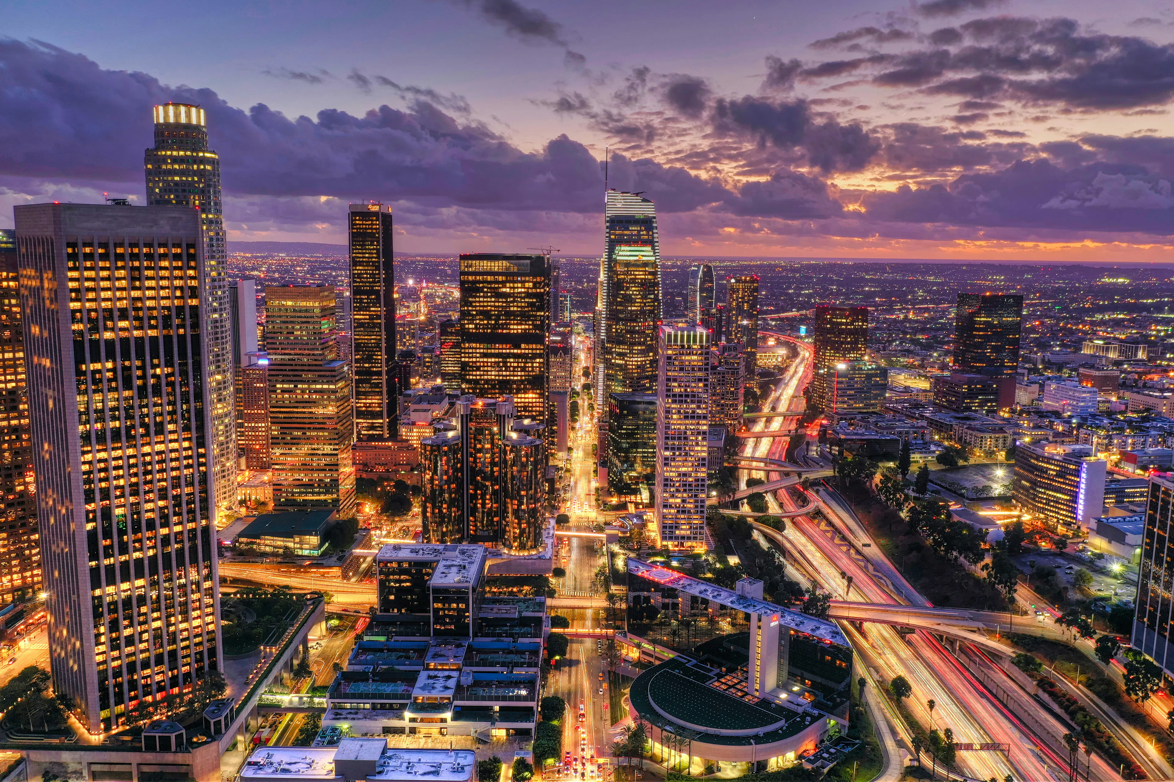 Downtown Los Angeles skyline illuminated at sunset