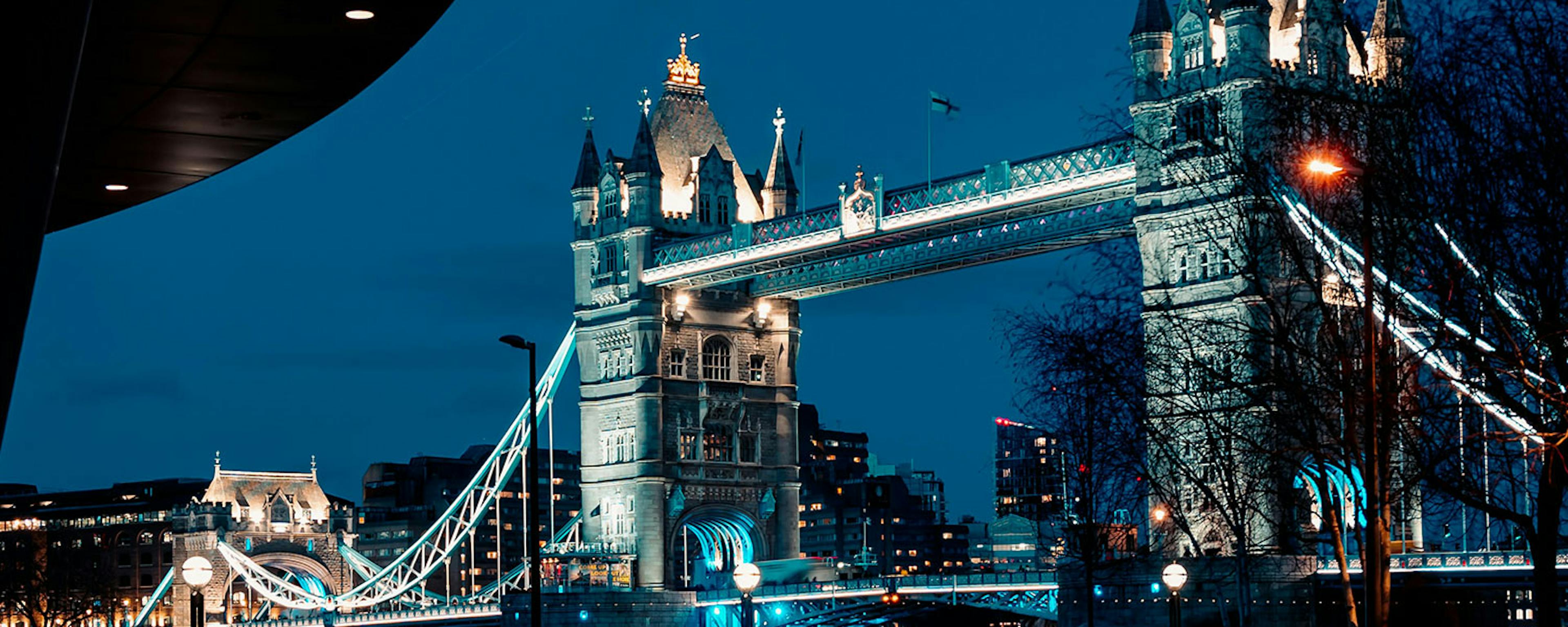 A bridge illuminated by lights from below