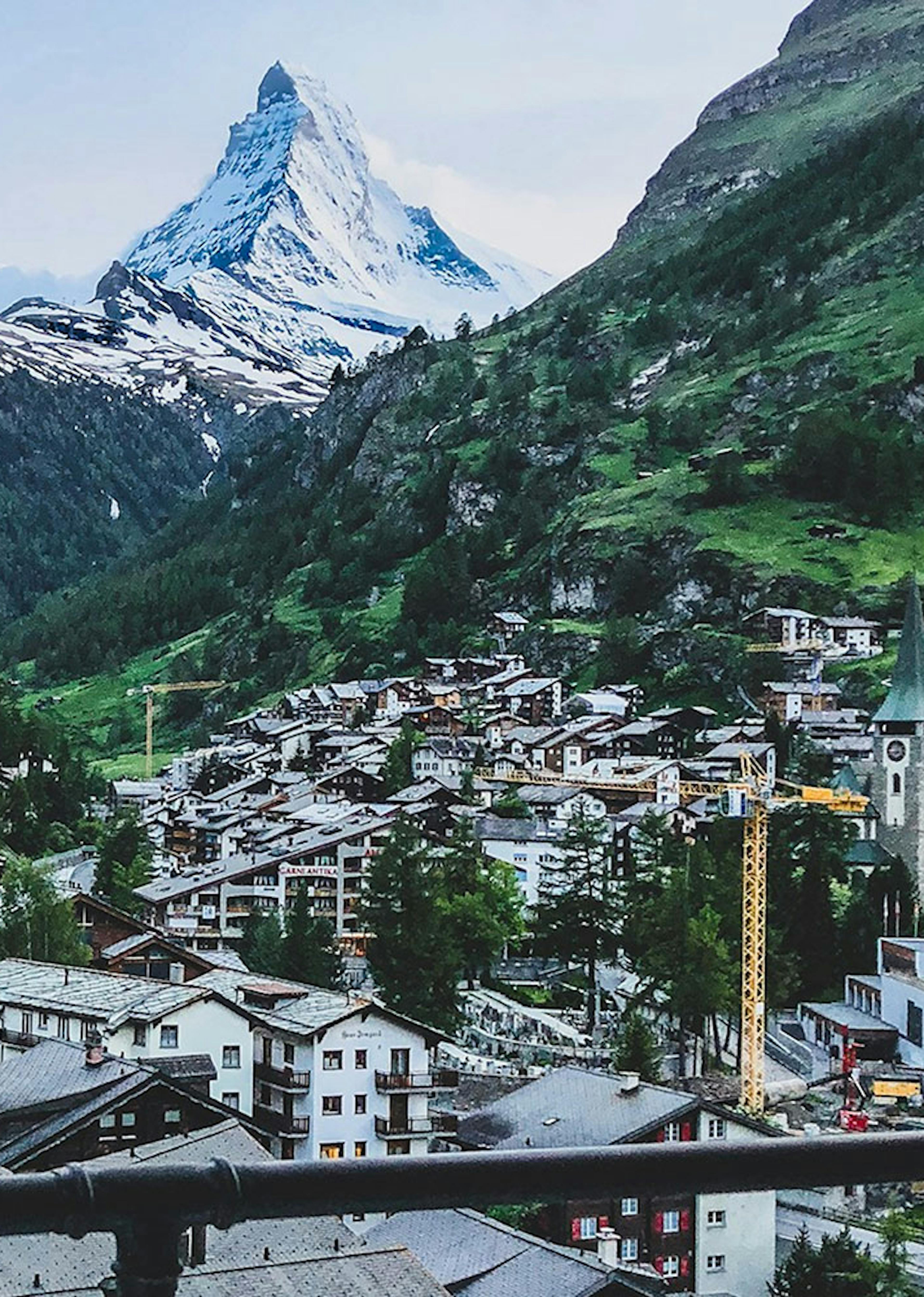 The Swiss alps surround a cozy mountain town