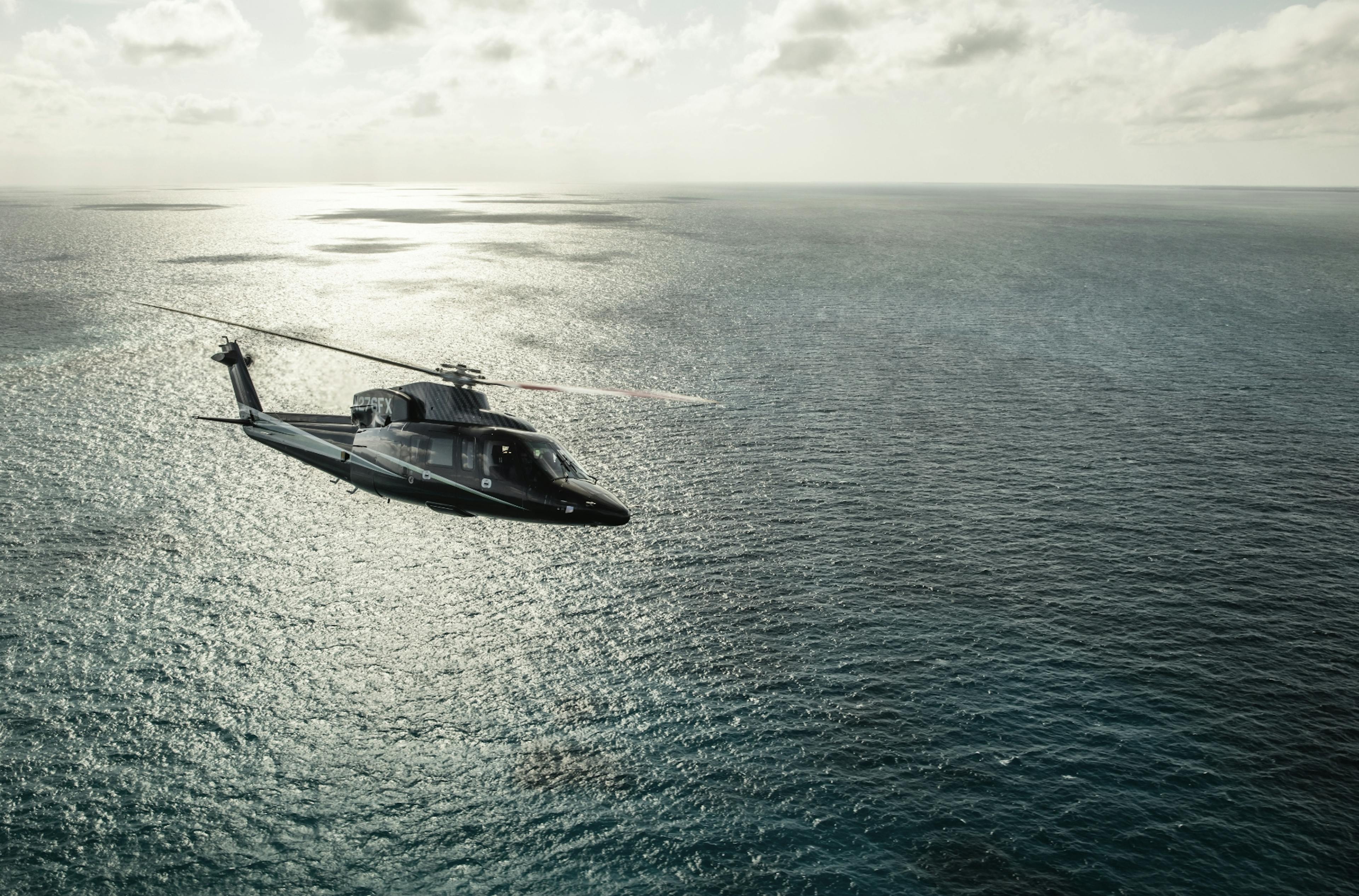 Sikorsky S-76 flying above water