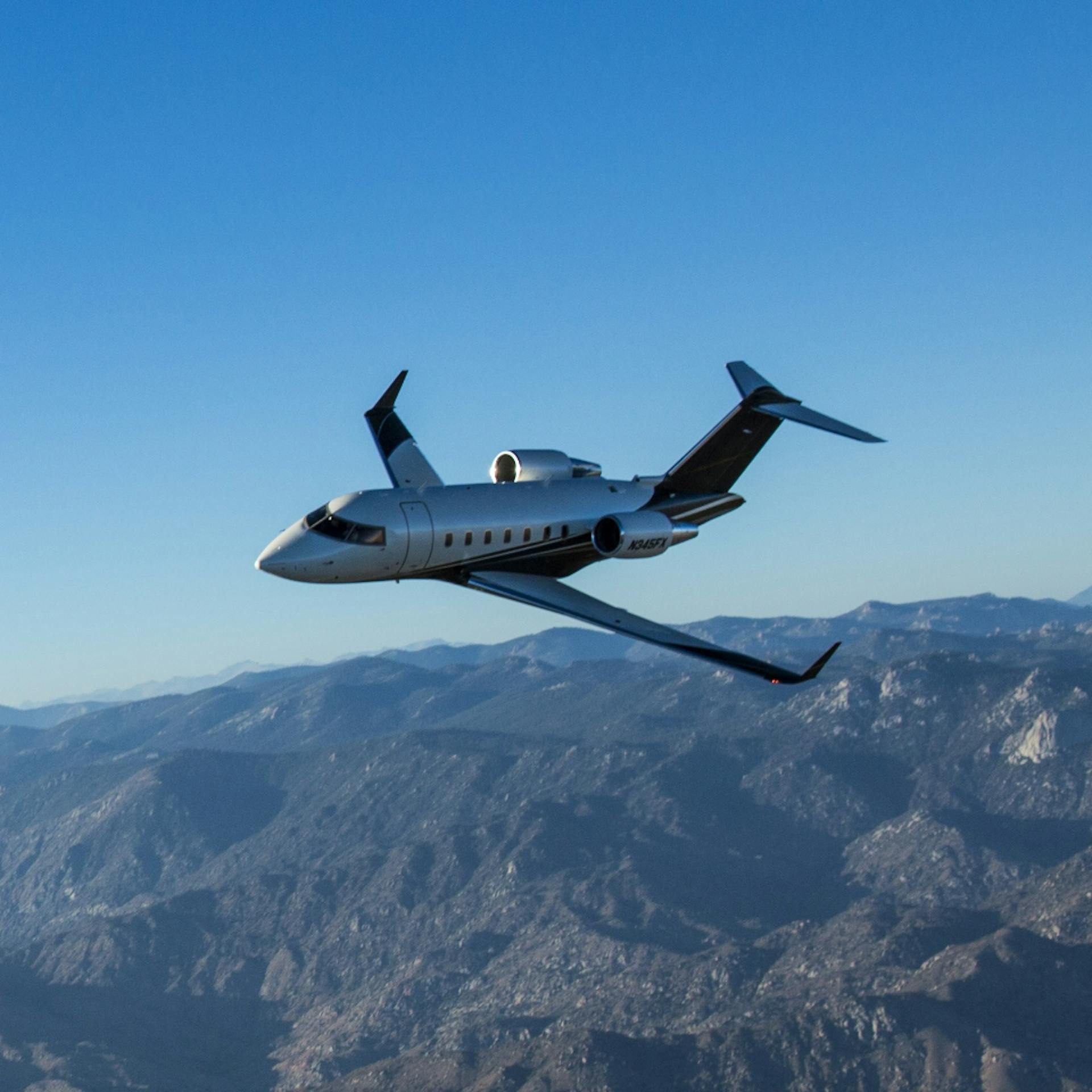 Challenger 300 over mountain region