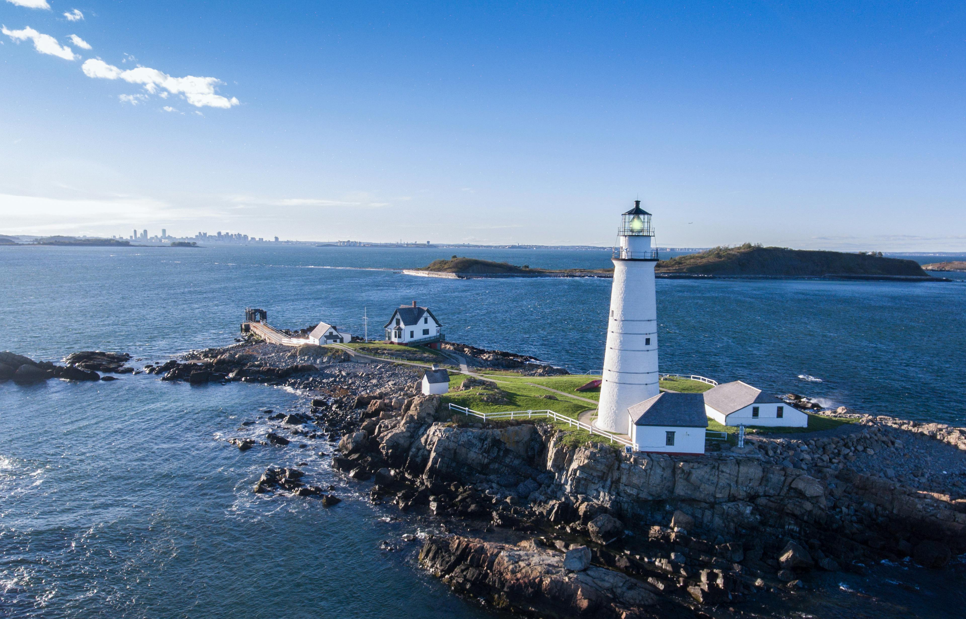 Skyview of a lighthouse on an island off shore of Boston