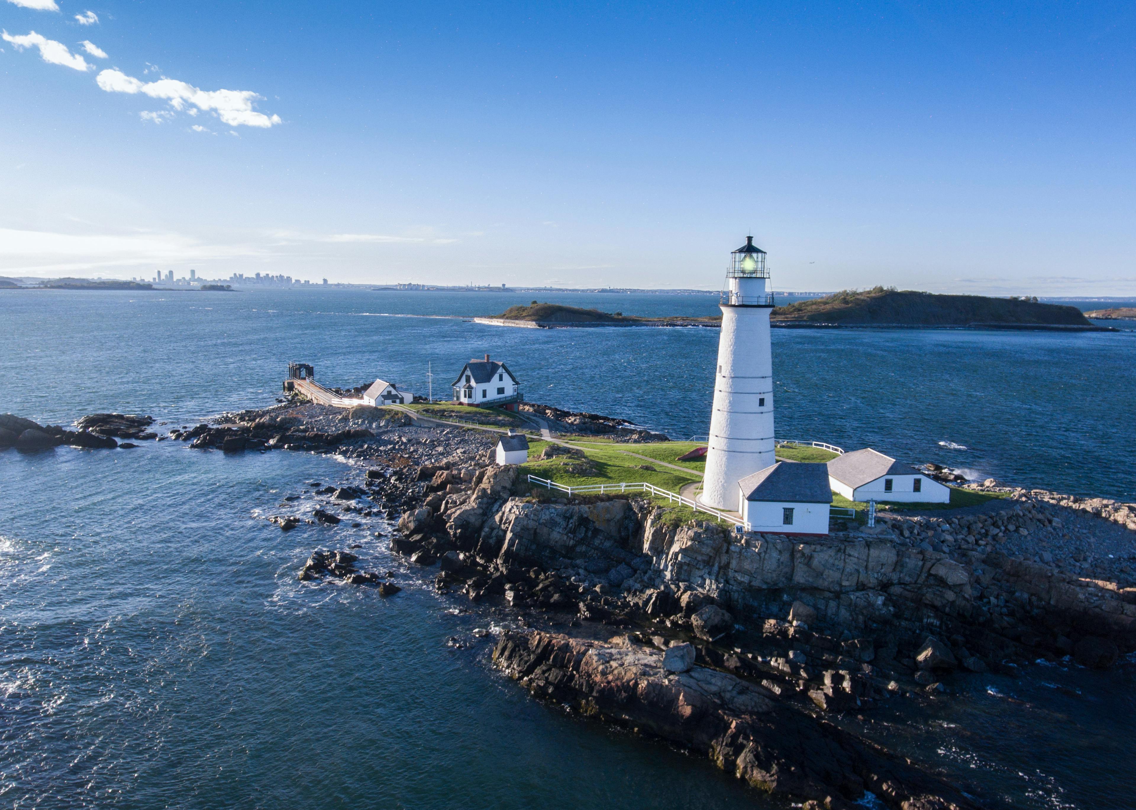 Skyview of a lighthouse on an island off shore of Boston