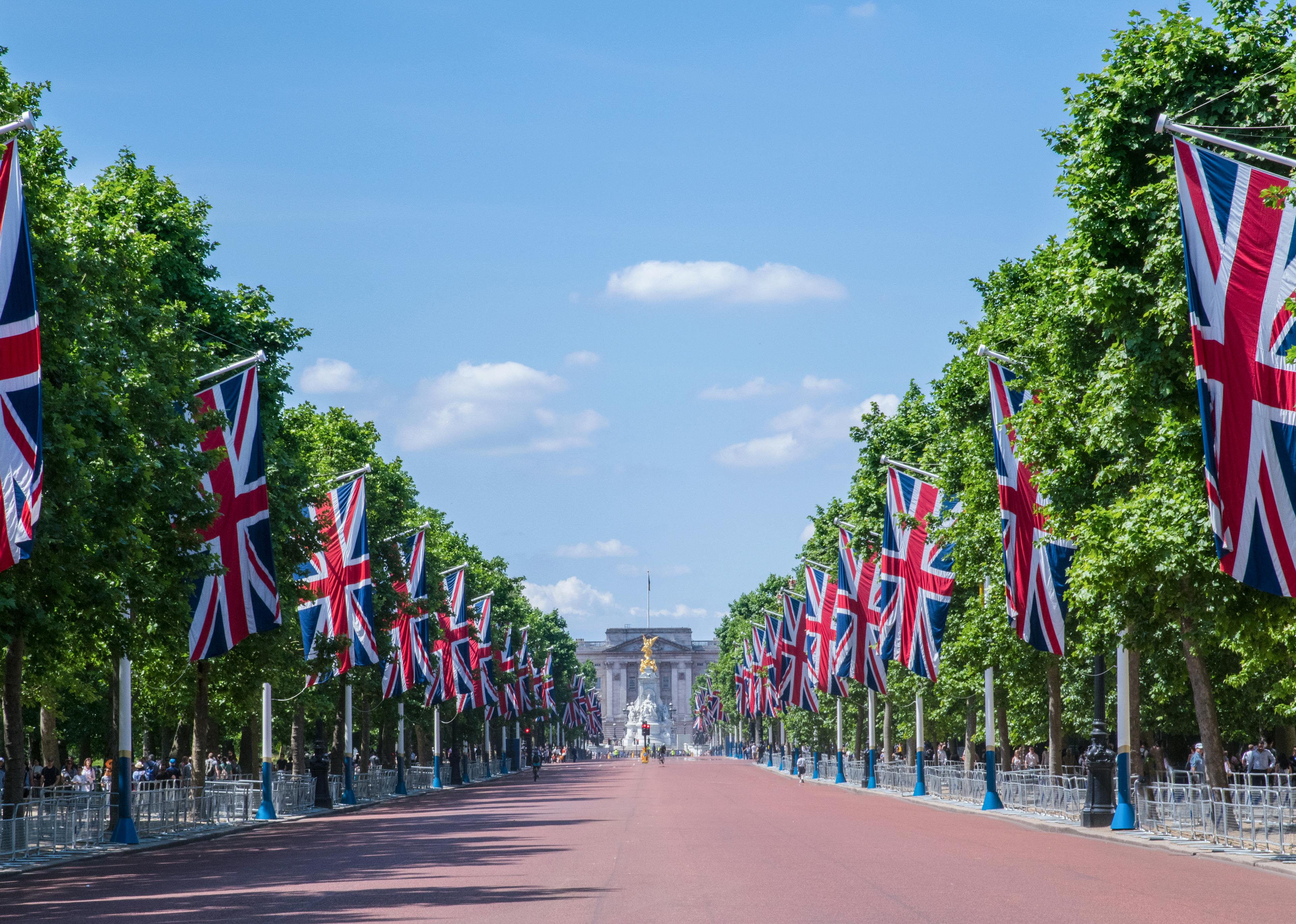 United Kingdom flags and trees lining a pathway