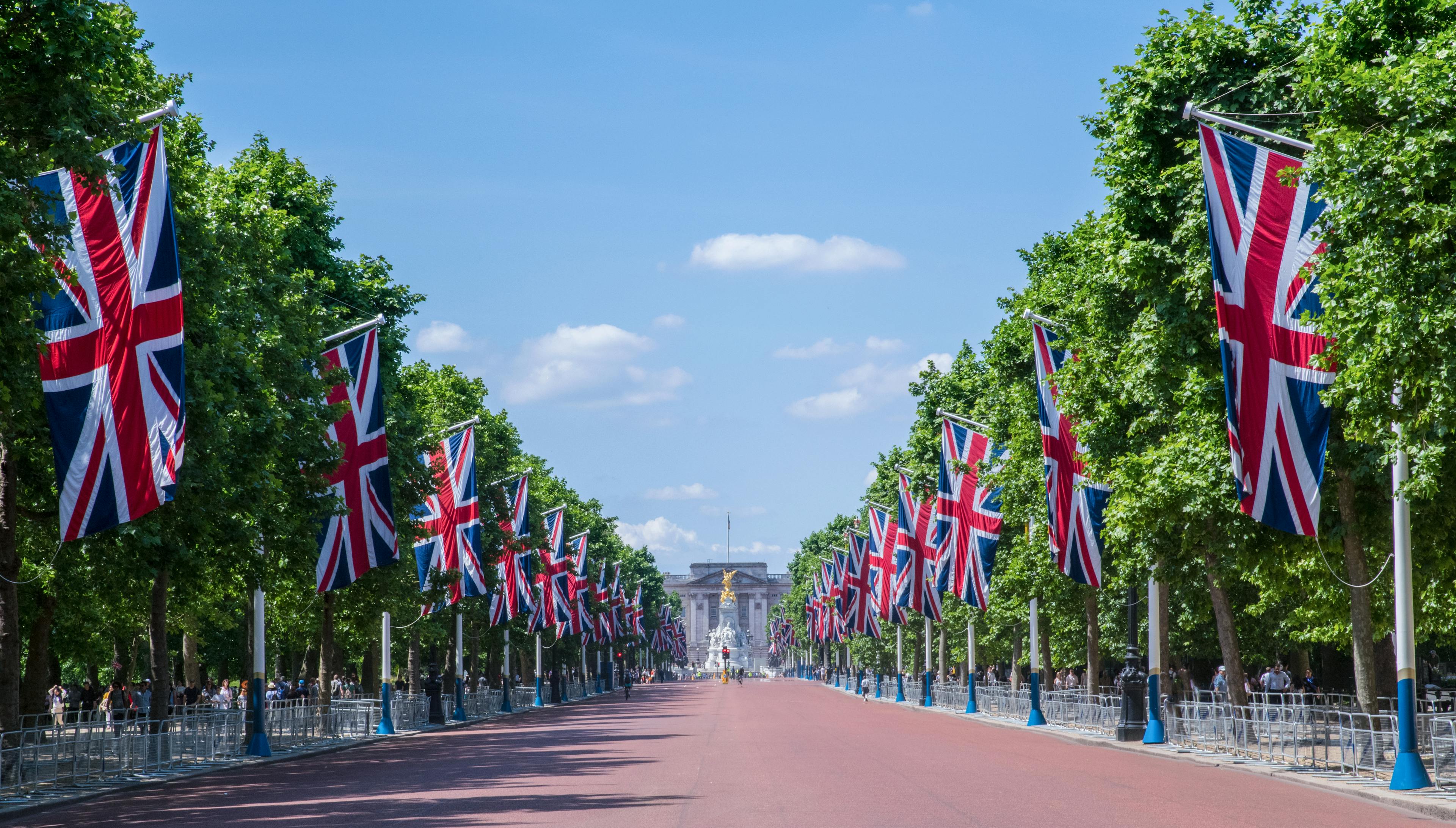 United Kingdom flags and trees lining a pathway