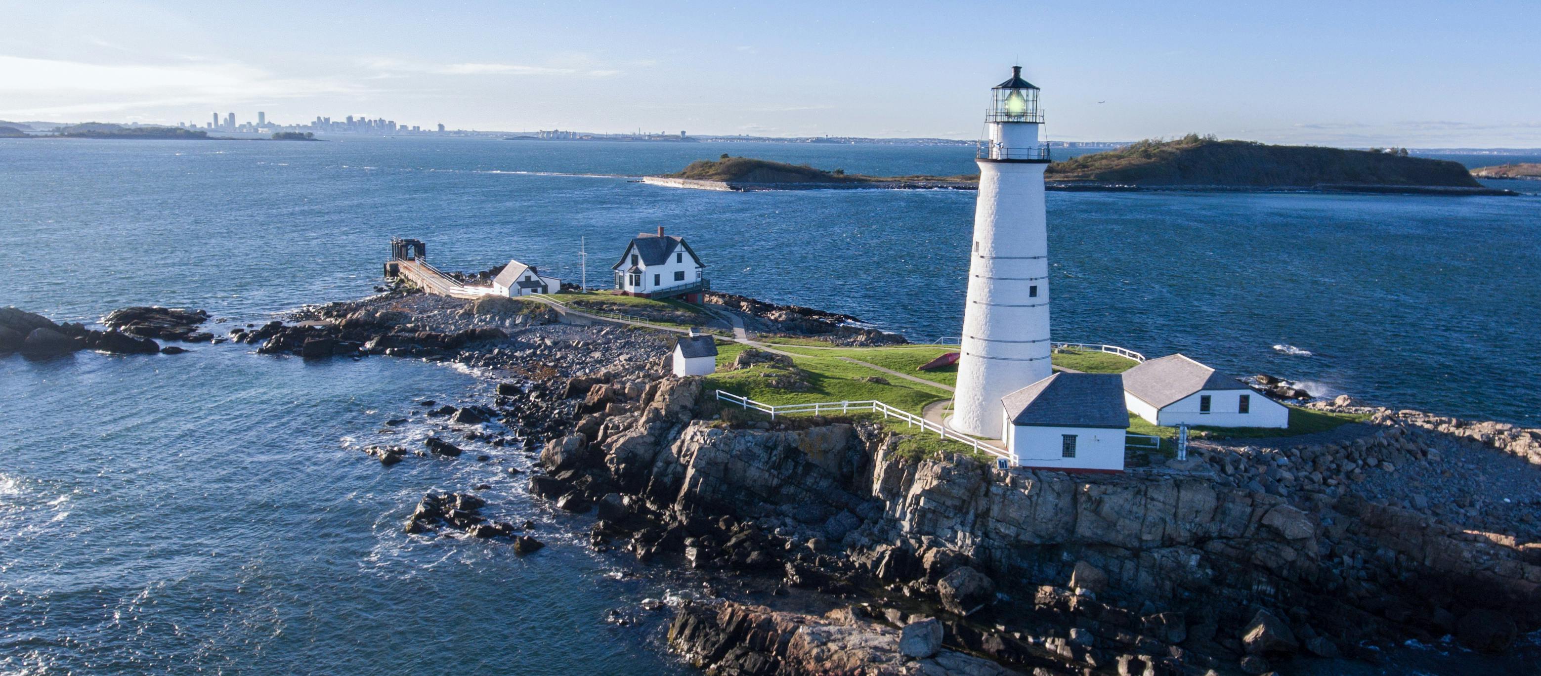 The shores with a lighthouse and craggy beaches