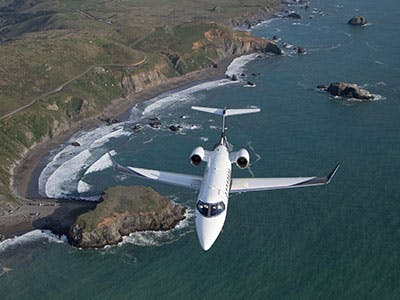 Jet flying over water view