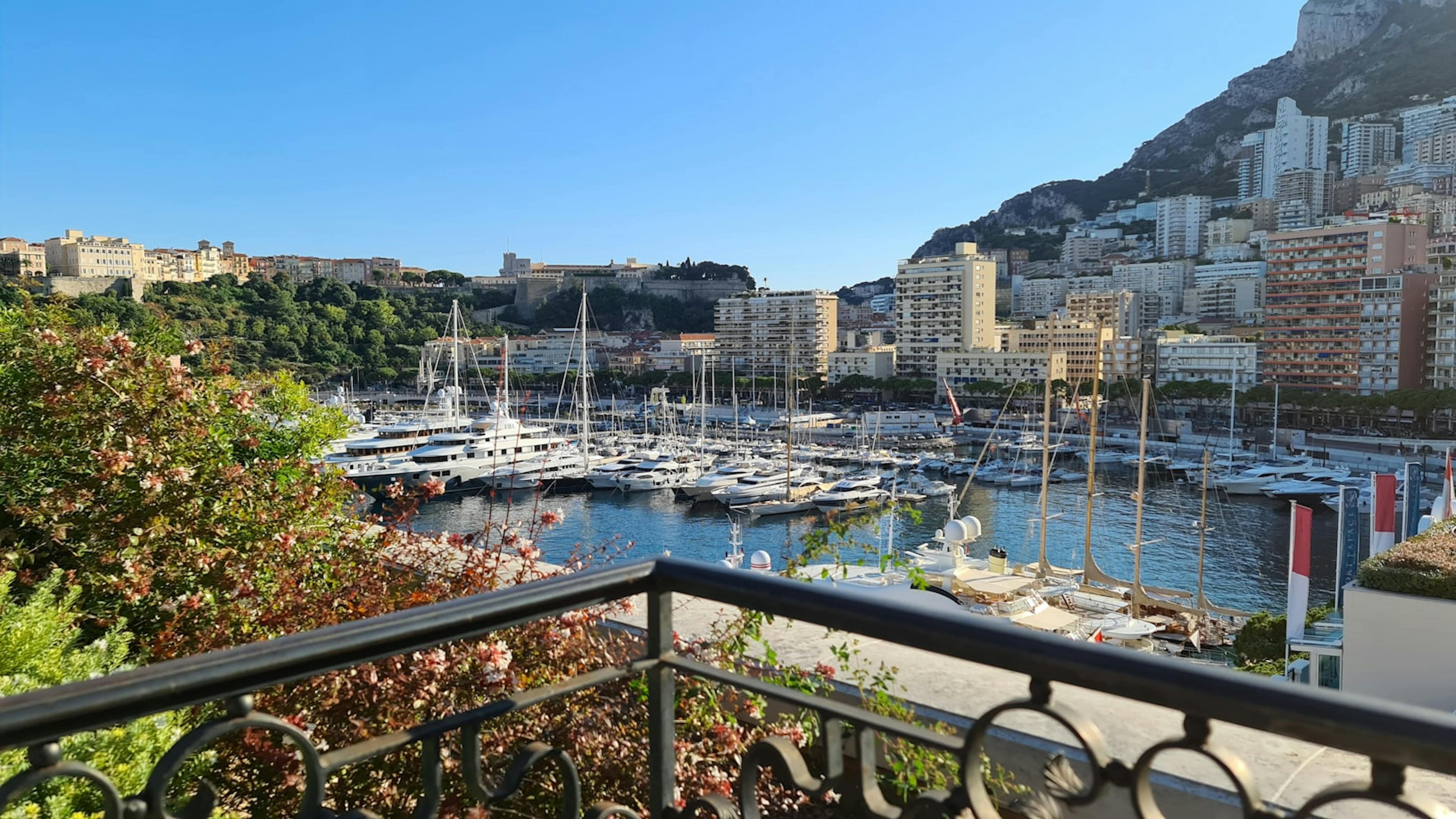 Jet and helicopter above Monaco coastline