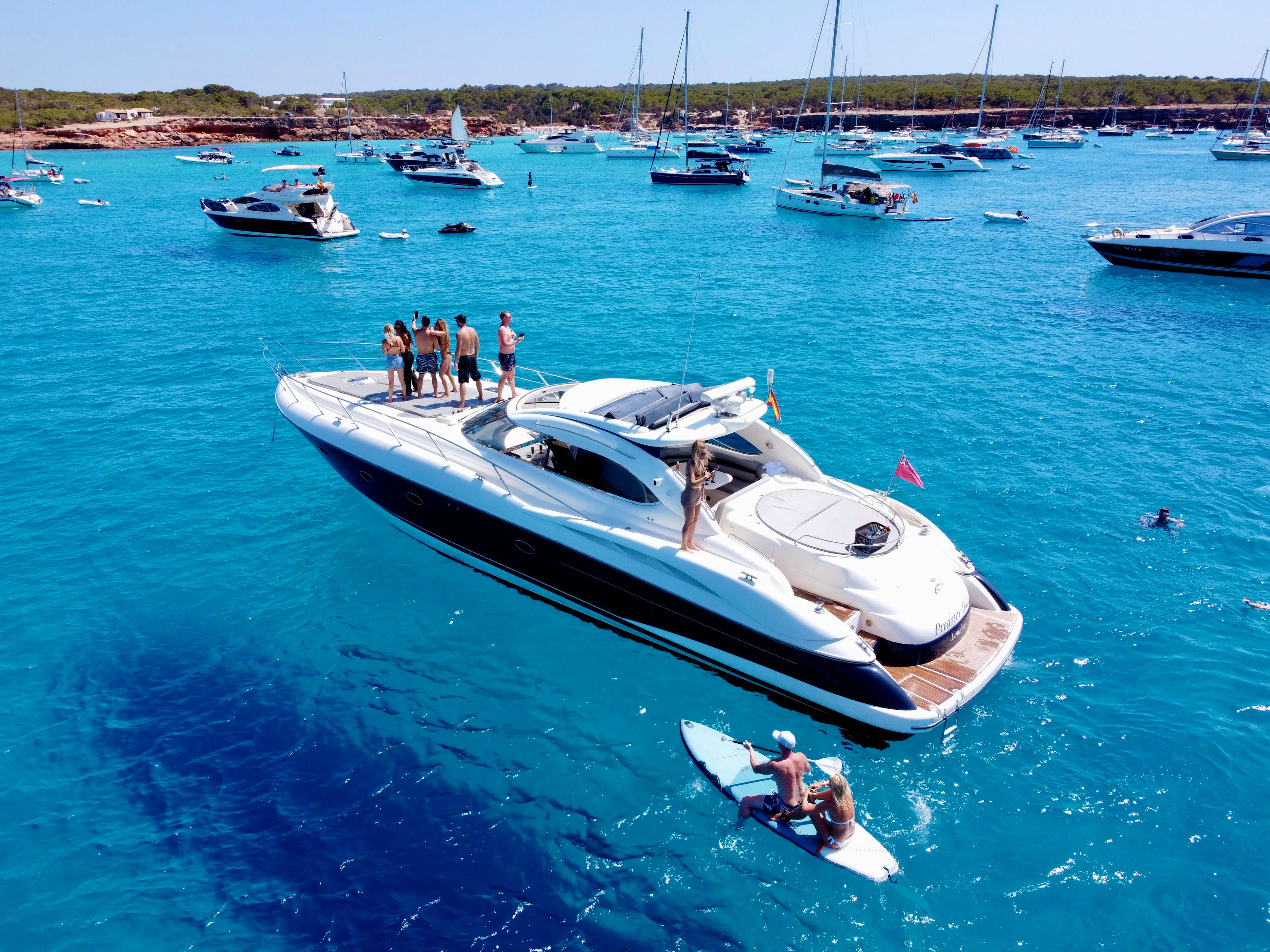 Luxury yacht anchored in the turquoise waters of Ibiza