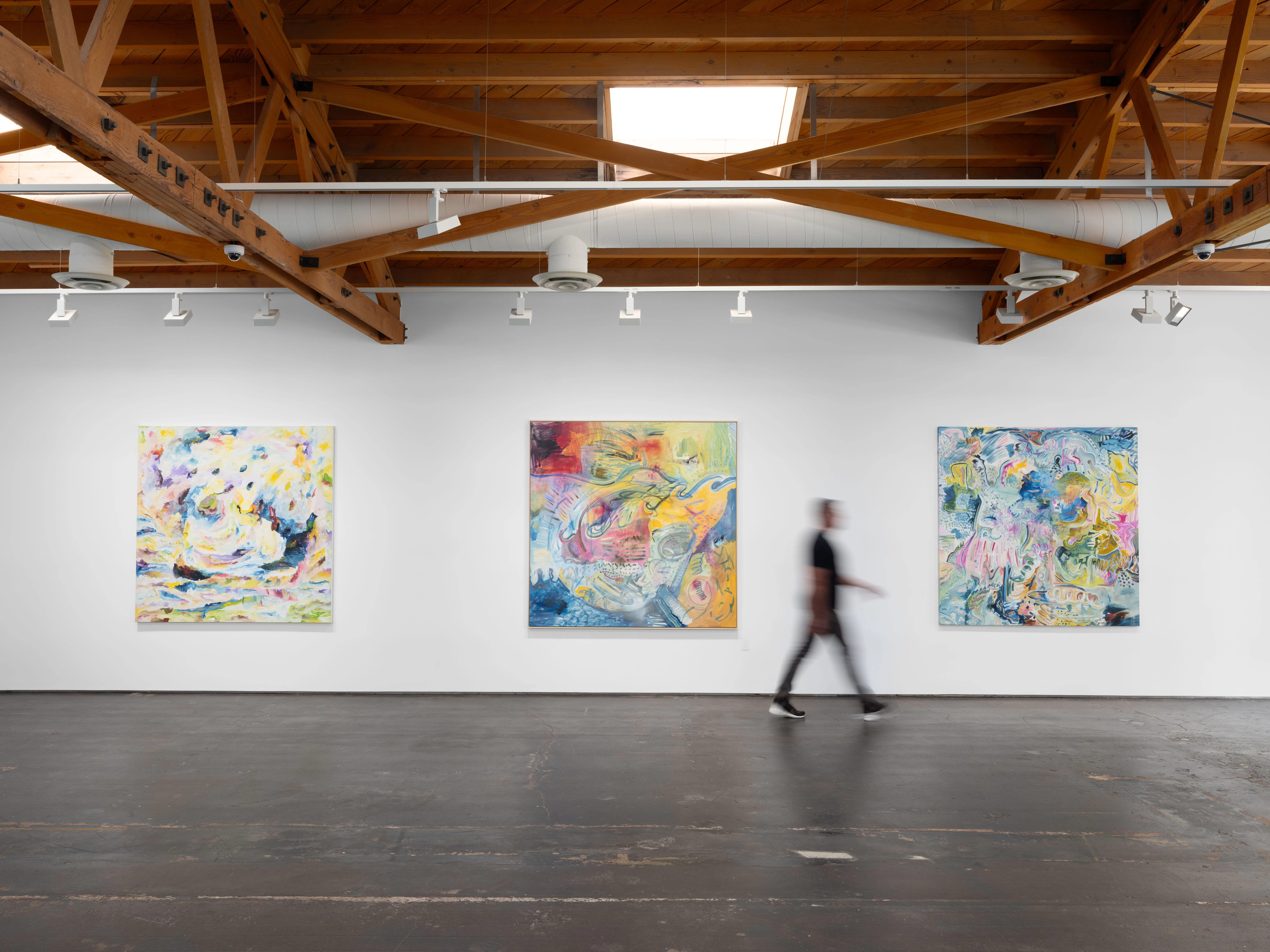 Wide installation view of Moncho’s exhibition Awakening at Gallery Sonder featuring large-scale abstract paintings in a contemporary gallery space with exposed wood beams.