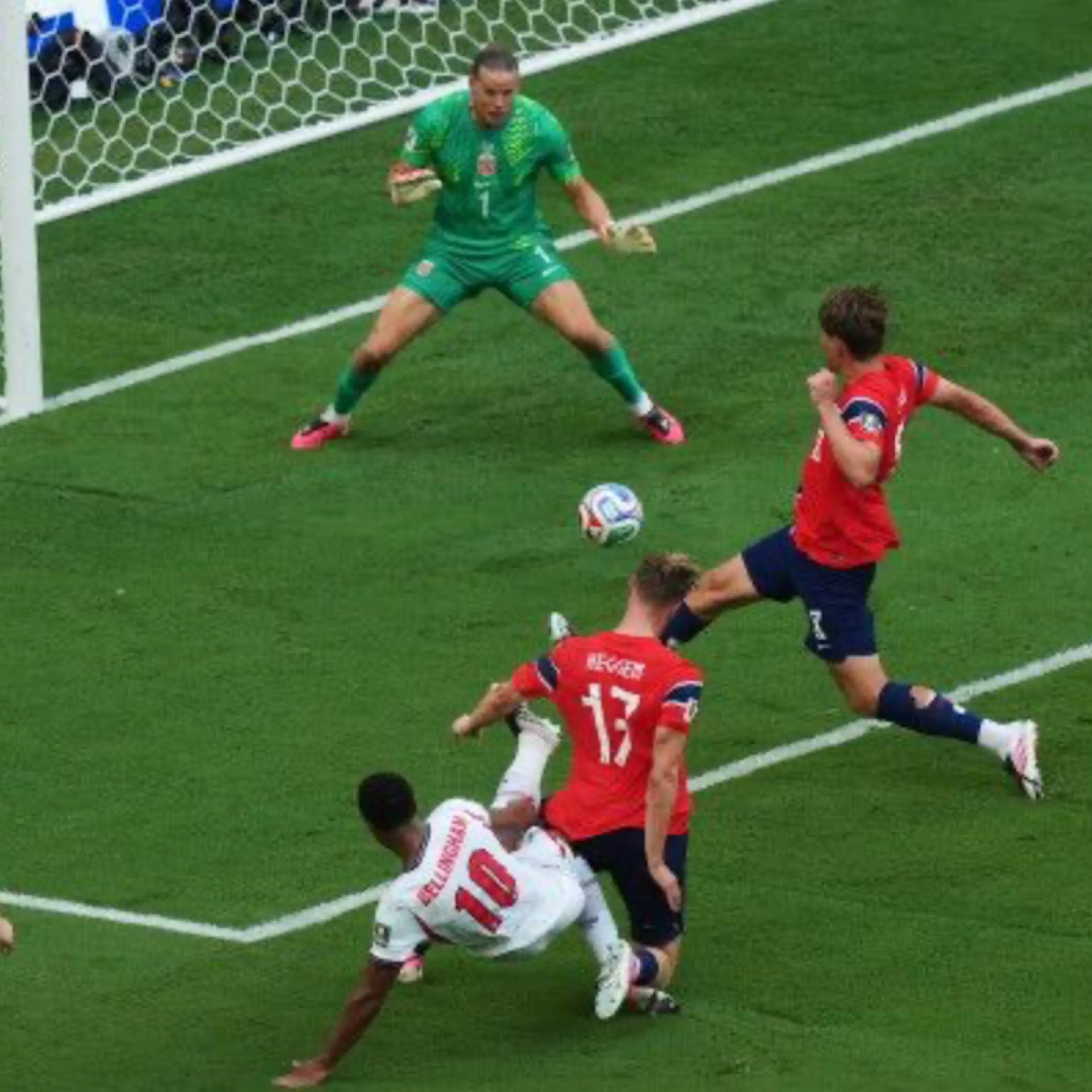 An overhead kick in front of goal — a specific moment, not an average