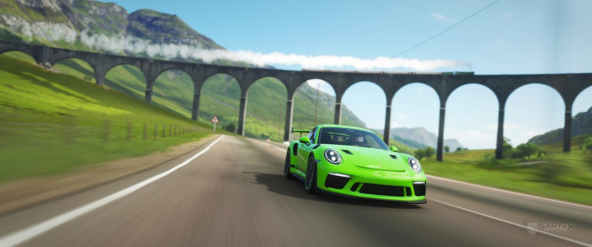 Porsche 911 GT3 RS under train bridge