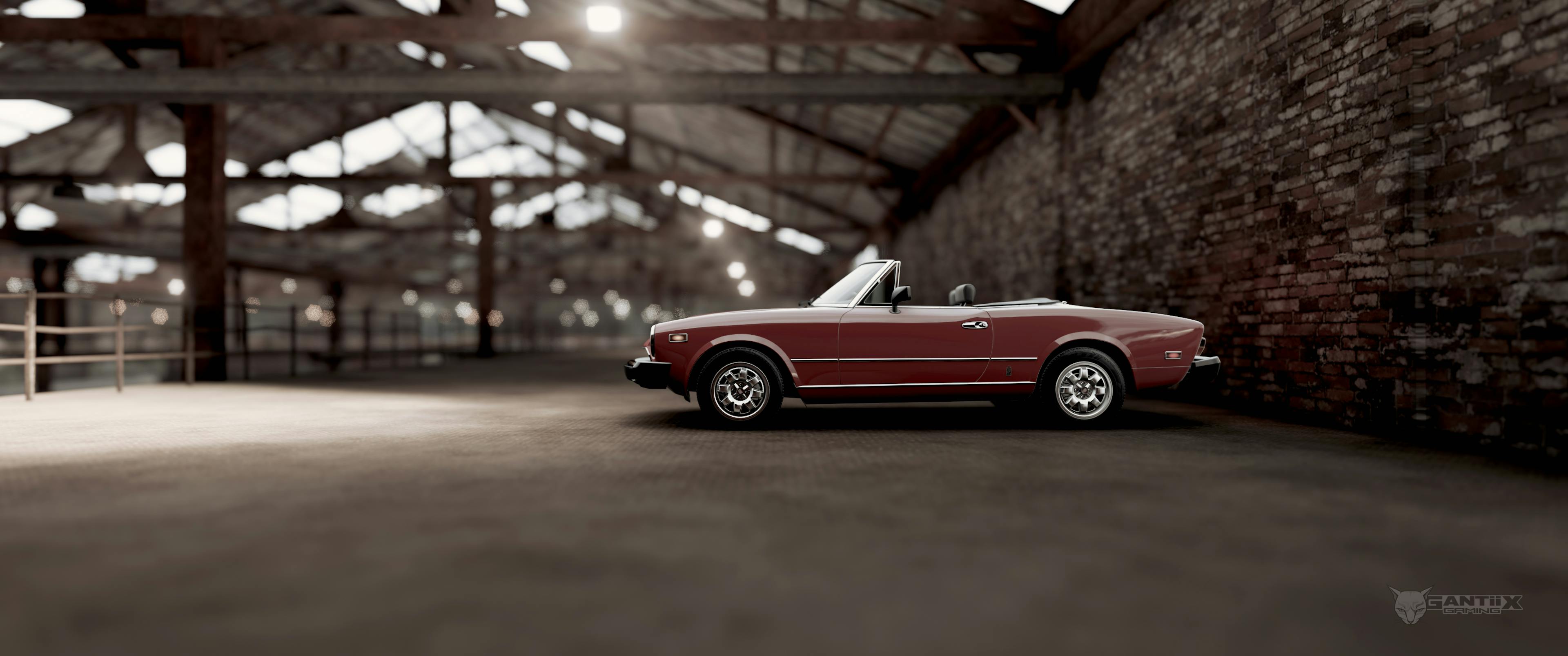 Fiat 124 Sport spider in warehouse