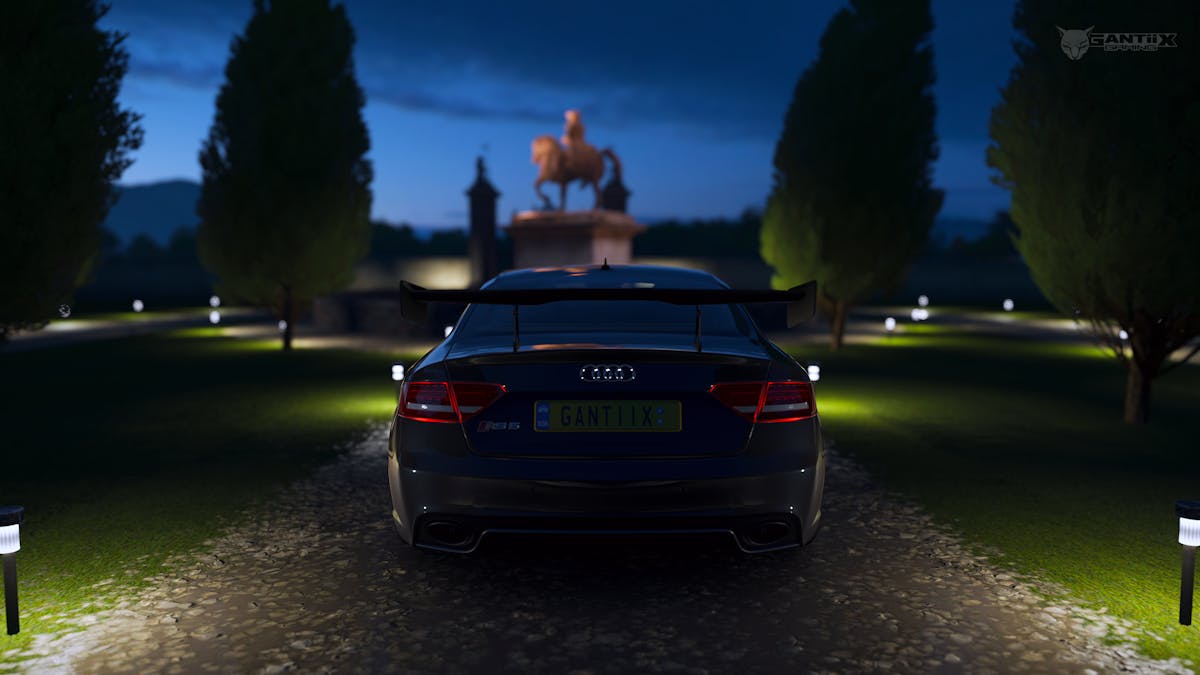 Audi RS5 in mansion at night