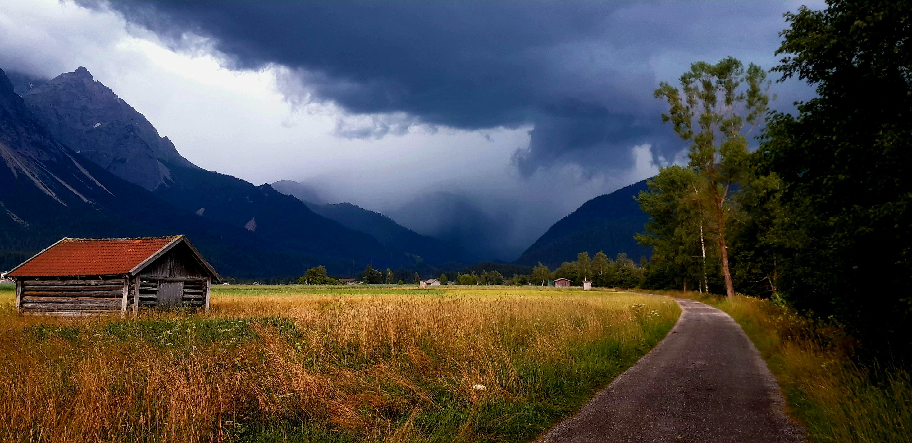 dark clouds above a mountain