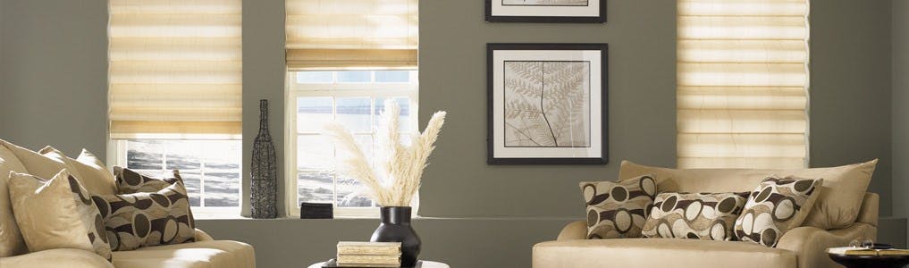 beige roman shades in a living room