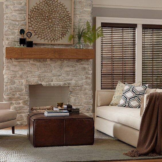 real wood blinds in a living room by a fireplace