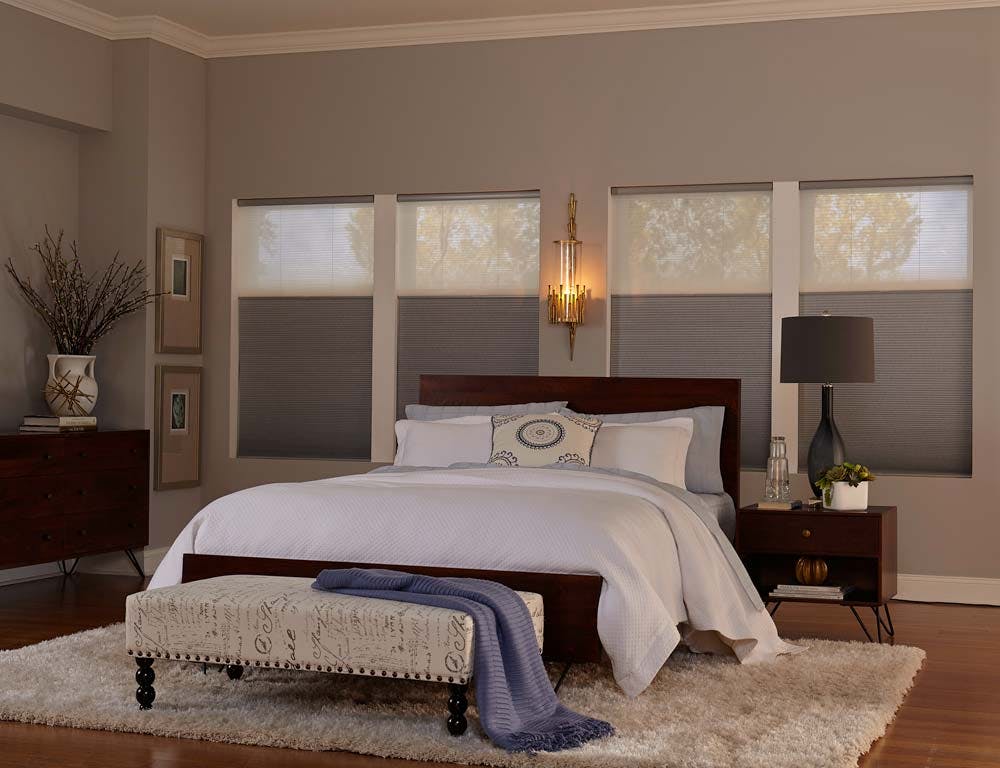 Serene bedroom with natural fabrics and textures and top down bottom up blinds