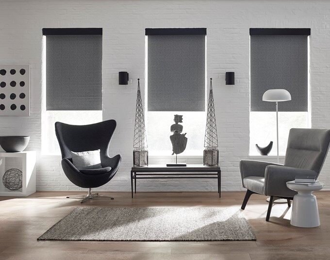 blinds.com blackout roller shade in a modern living room