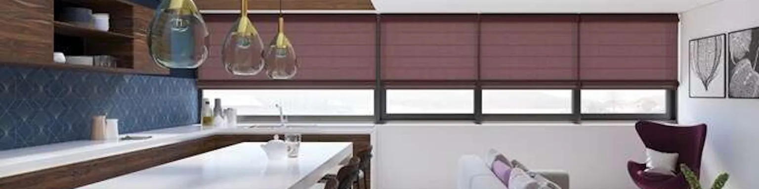 Levolor brand roman shades in an open concept kitchen to living room