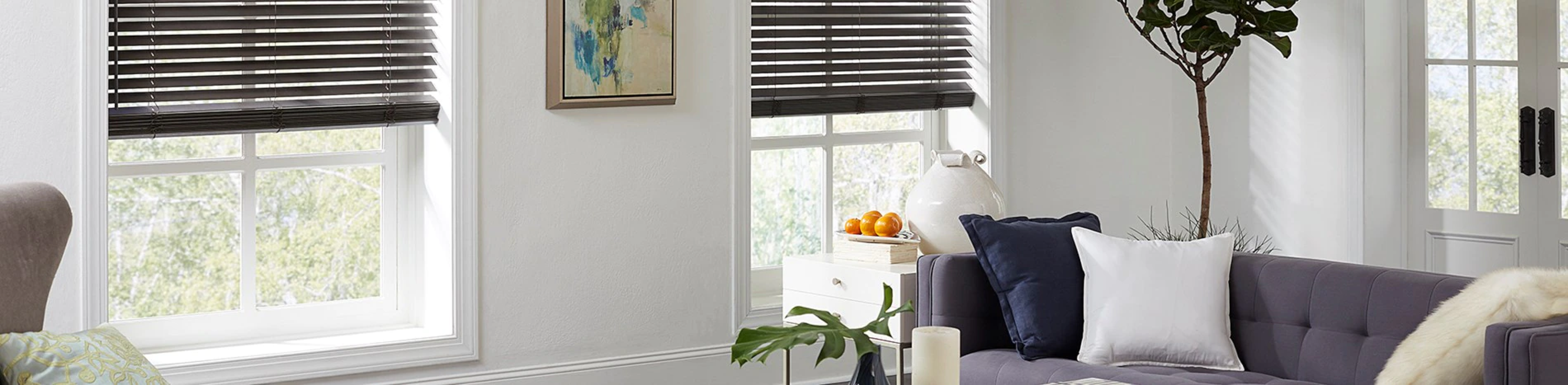 dark wood blinds against a white wall in a bright living room