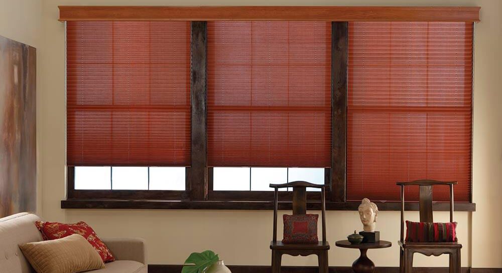 Red shades in an earthy toned living room