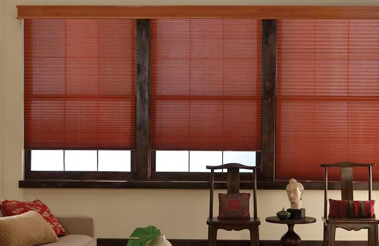 Red shades in an earthy toned living room