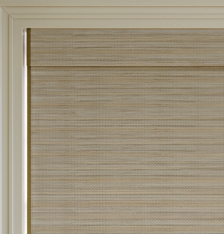 Home office with natural woven wood shades that bring texture and warmth to the space