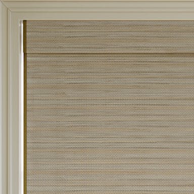 Home office with natural woven wood shades that bring texture and warmth to the space