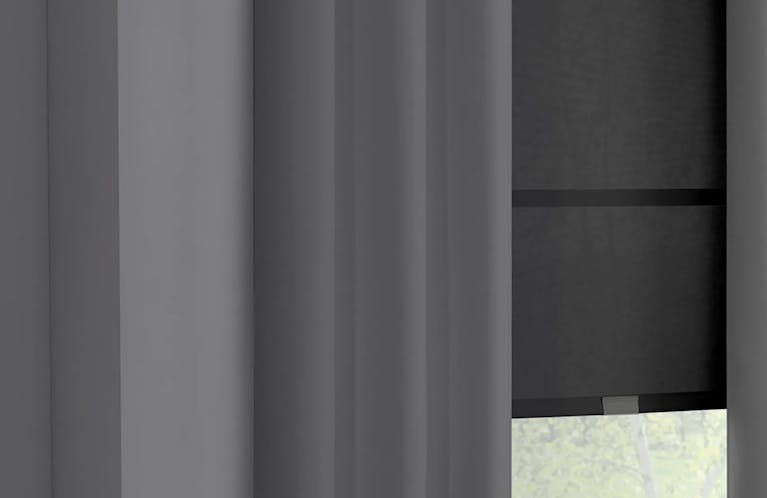 black roller shade on window