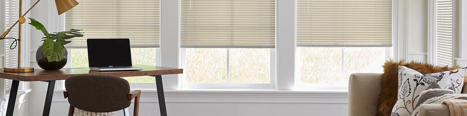 Cyber Monday sale header with a bright living room and white mini blinds