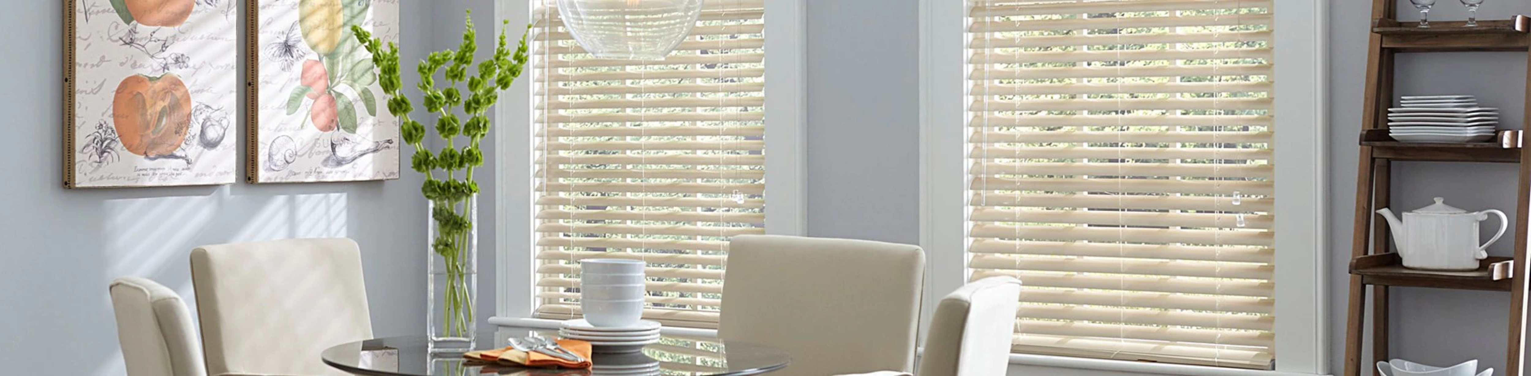 Off-white mini blinds in a bright breakfast nook