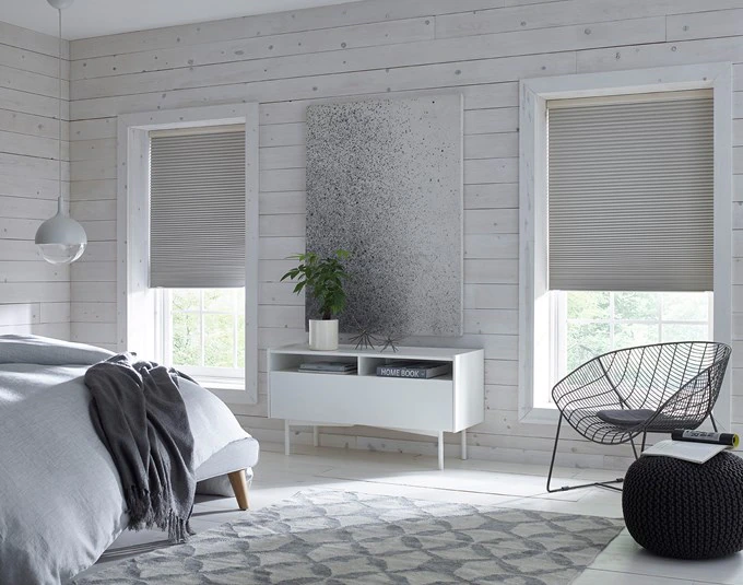 neutral SouthSeas blackout cellular shades in a bright bedroom