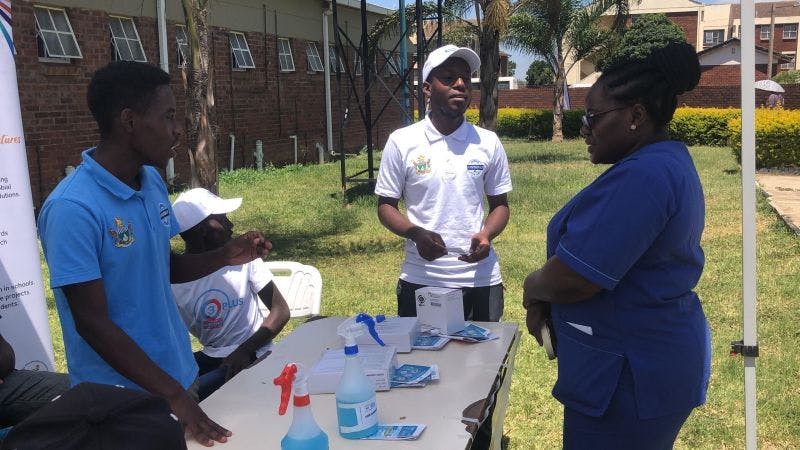 People socializing at GSA's anti-microbial resistance event.