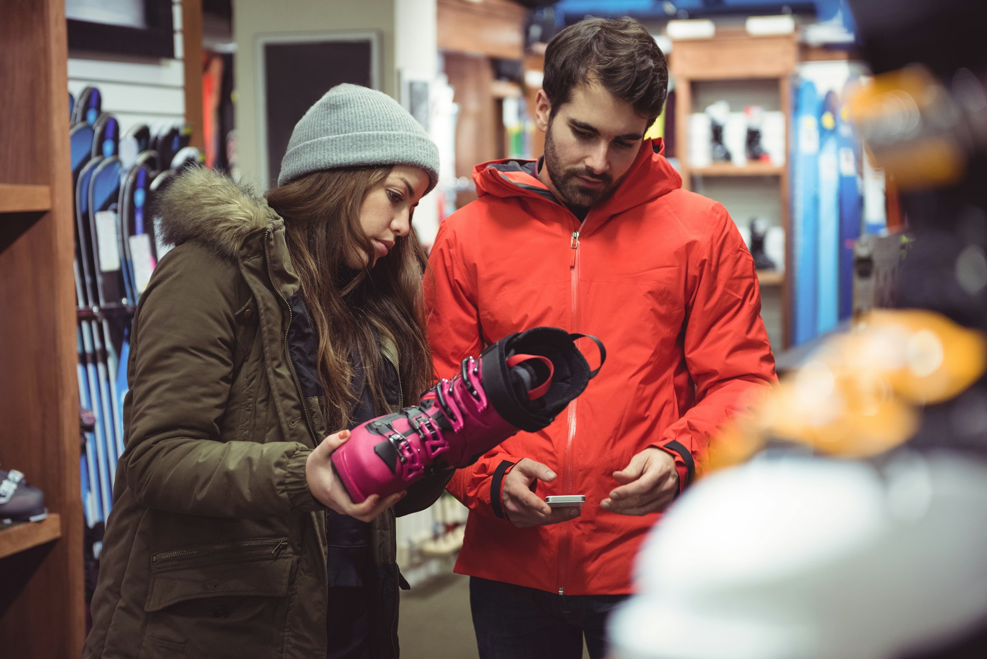 Couple buying ski gear at a Vail ski shop