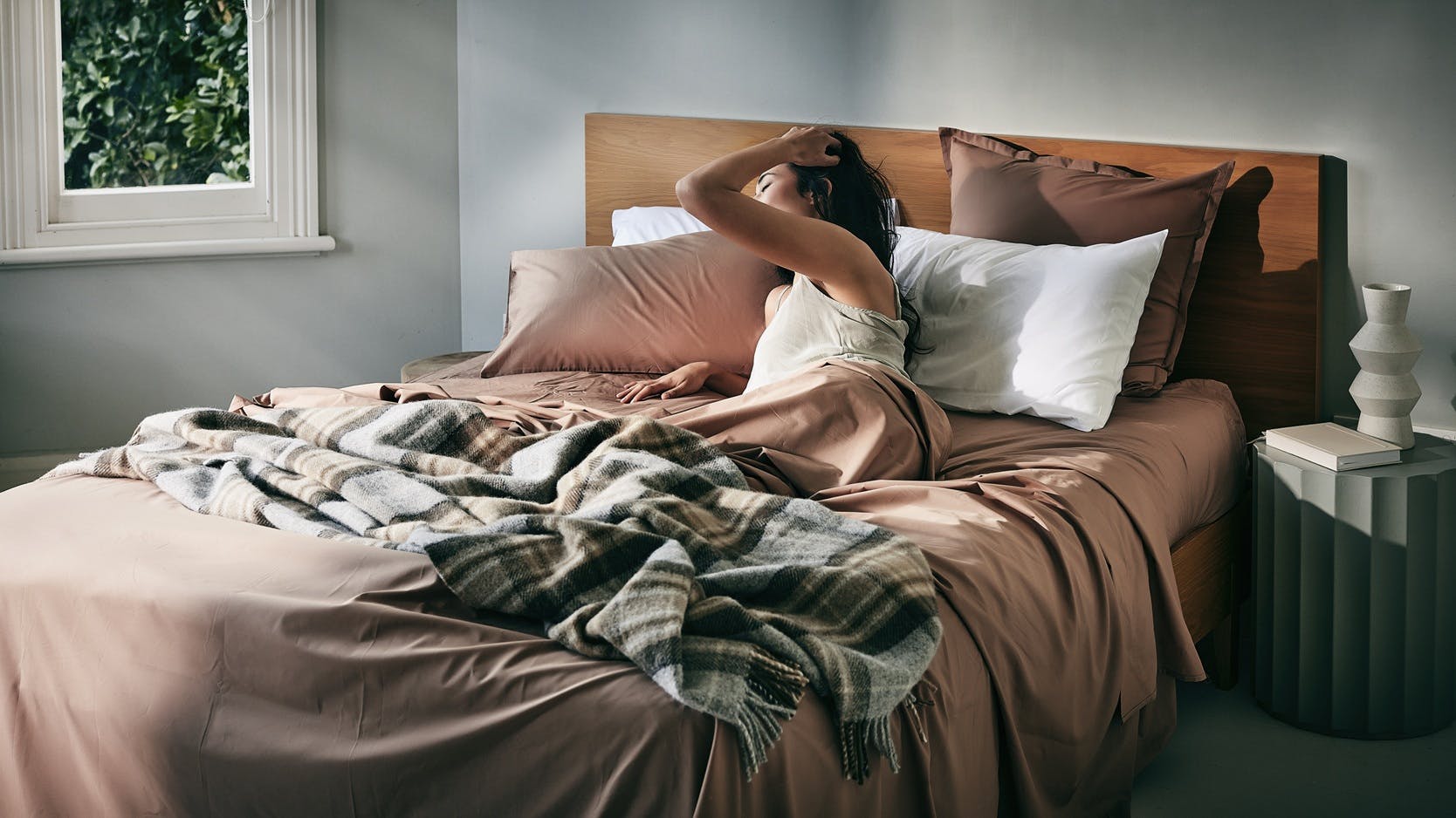 The woman has just woken up.