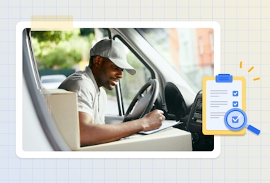 How to get courier contracts. Upper body of a courier driver in a vehicle writing a note whilst leaning on a white box.