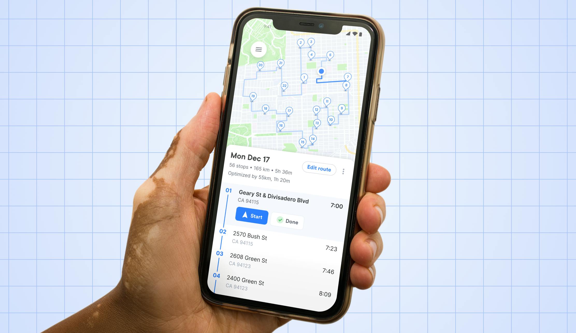 A hand holding a phone with the Circuit Route Planner application open. The screen shows an optimized route for delivery drivers.